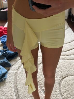 White Fox Boutique Pale Yellow Ruffle Front High-Waist Shorts